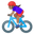 велосипедистка с средним тоном кожи